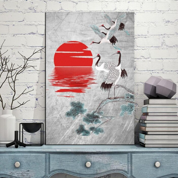 Tableau grue et soleil rouge