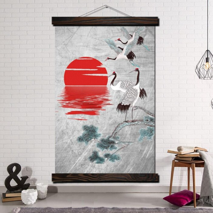 Tableau grue et soleil rouge