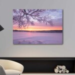 Tableau lever de soleil en hiver. Bonne qualité, original, accrochée sur dessus d'un canapé dans une maison